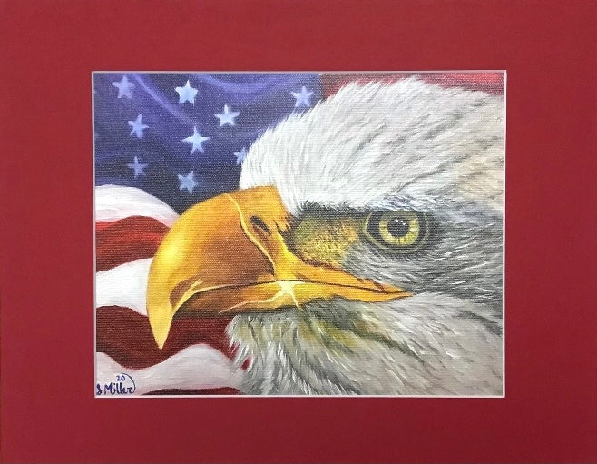 Giclee print of a bald eagle against a waving American flag backdrop, matted in red