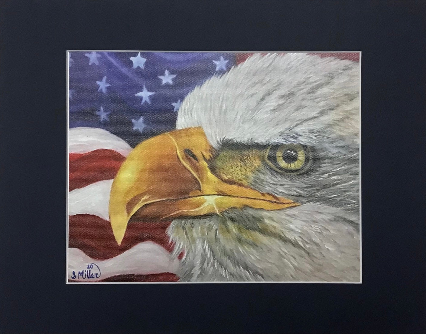 Giclee print of a bald eagle against a waving American flag backdrop, matted in blue